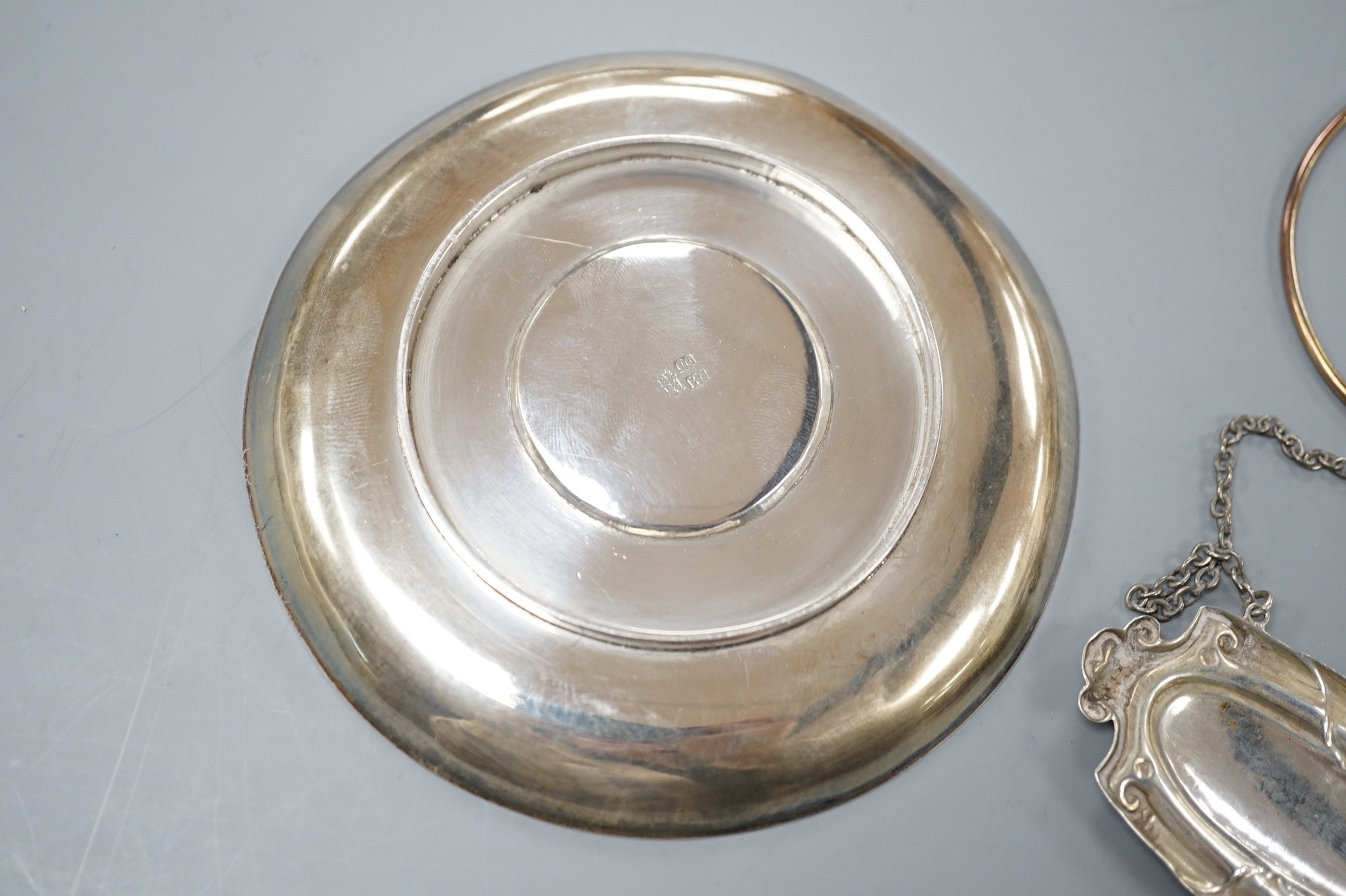A George III silver 'Port' wine label, Phipps & Robinson, London, 1805, two later silver wine labels and a Chinese dish, signed LH.